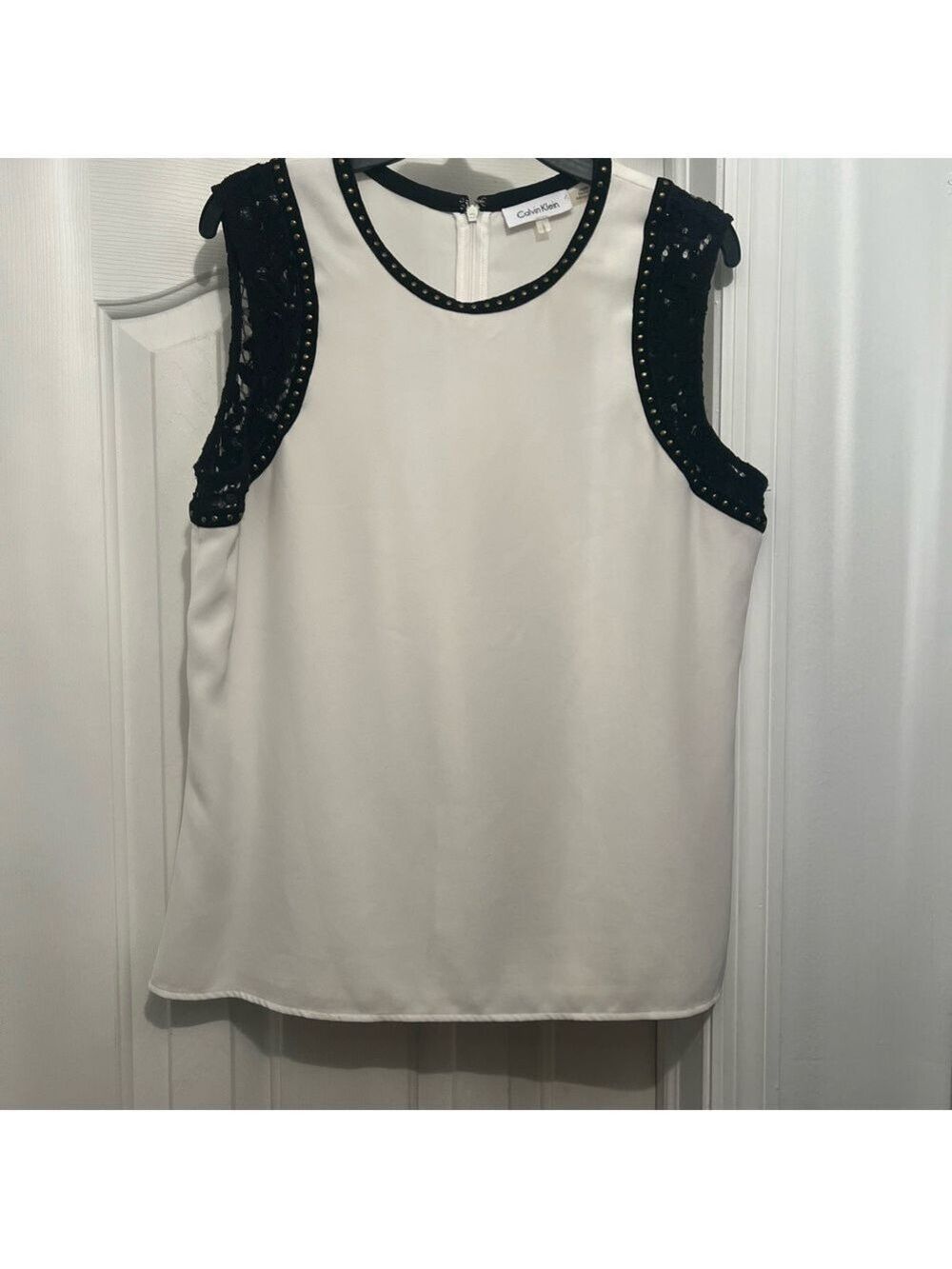 Calvin Klein sleeveless top.